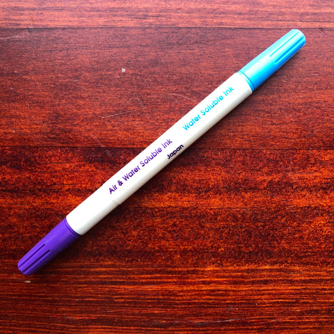 Dual purpose marking pen
